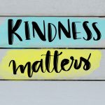 Kindness matters inspirational message on grey wooden background