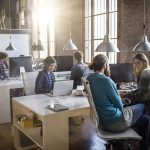 Young creative business people working in the office